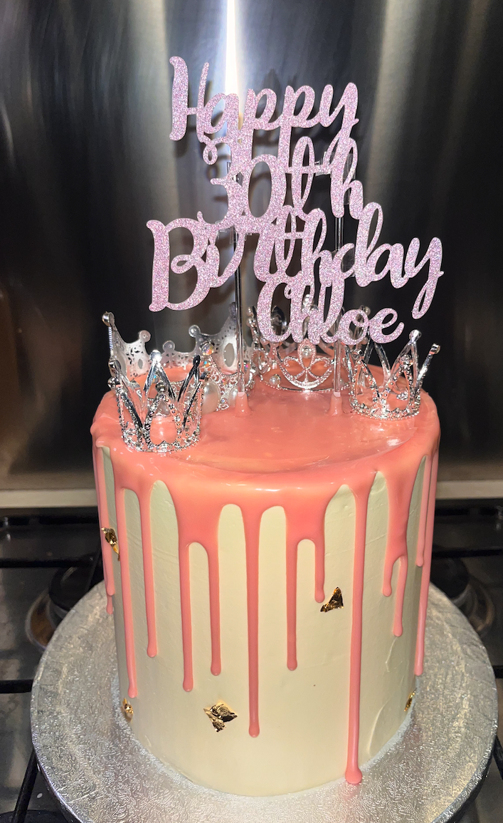 Princess themed birthday cake with pink drip