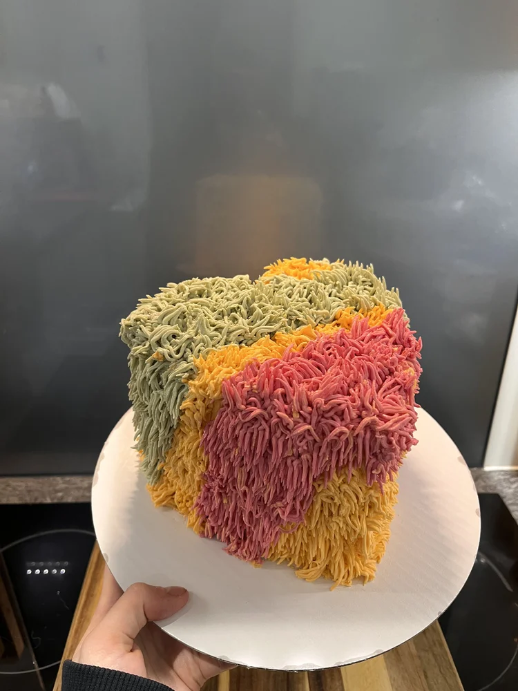 Buttercream cake with shaggy heart design